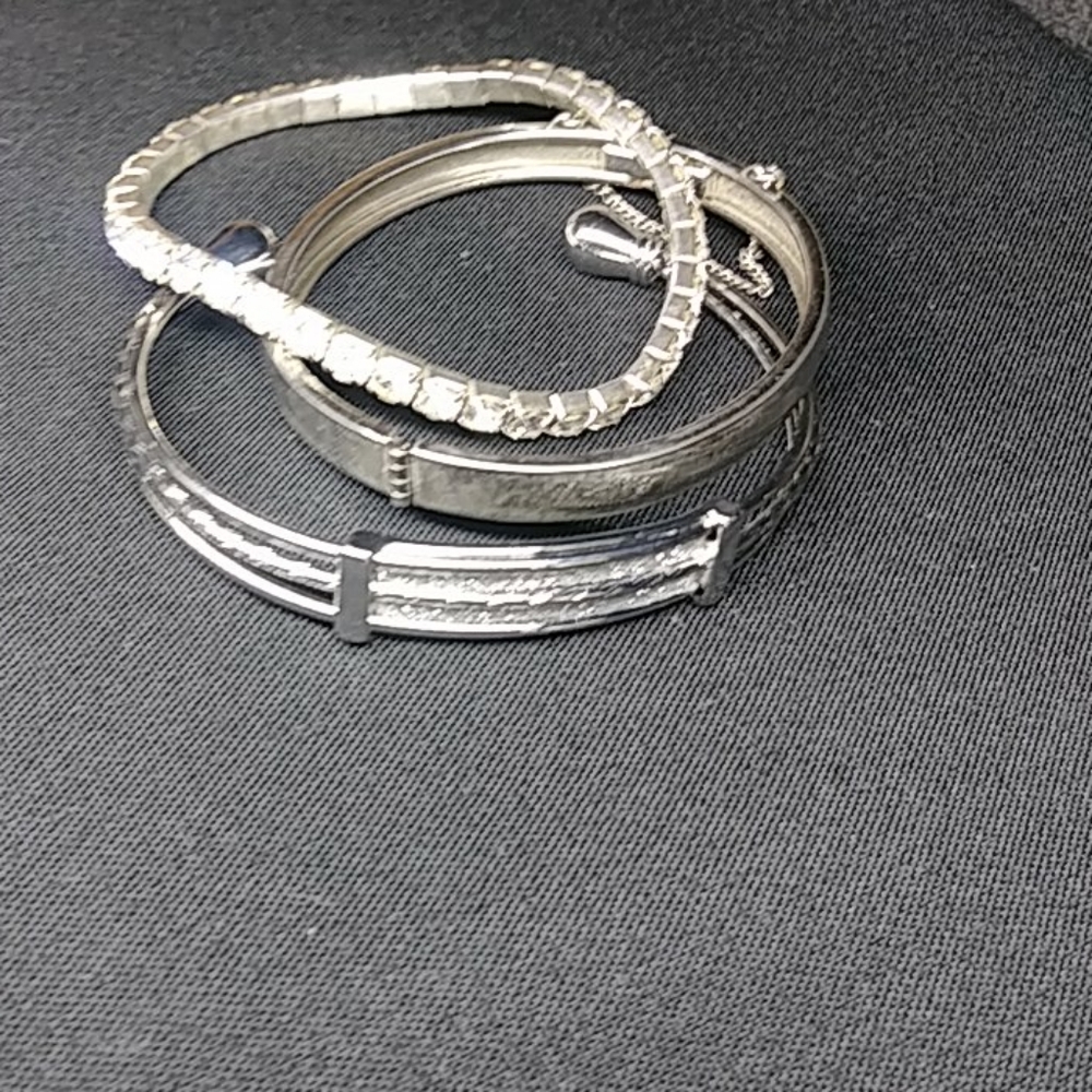 Silver toned bracelets